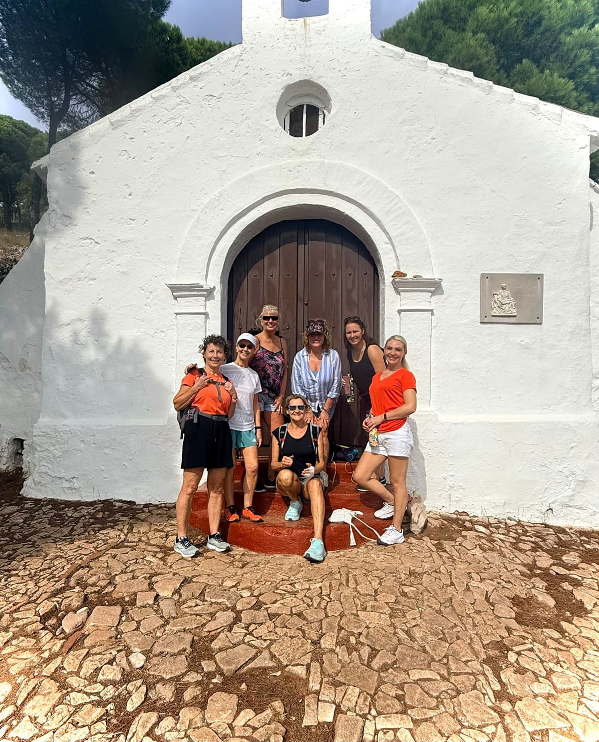 Group excursion photo at a local chapel